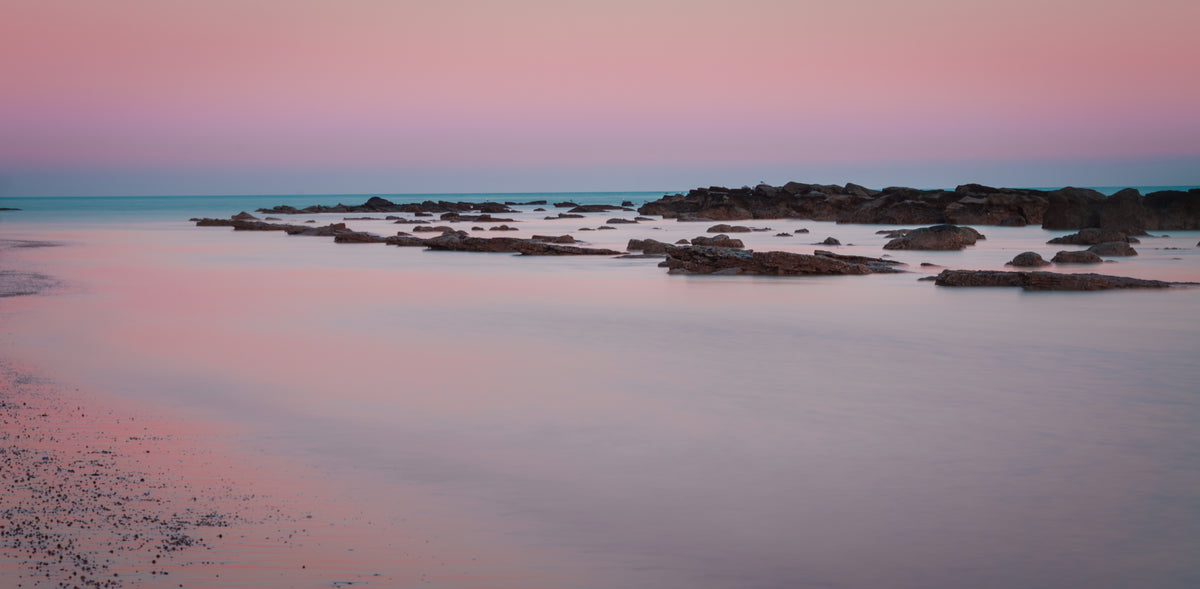 Sunset over Hastings Beach at Low Tide